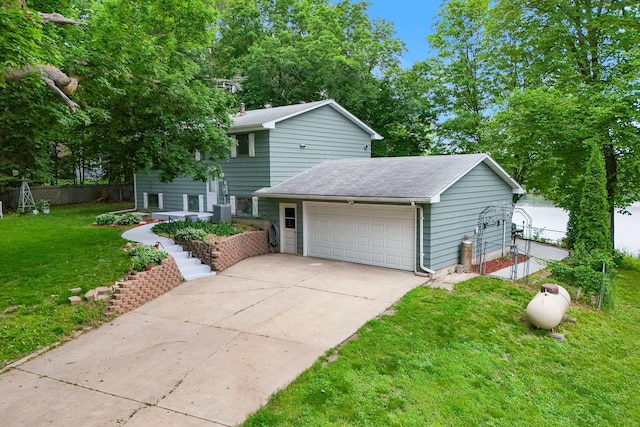 1060 Greer Ave NW, Albion Twp, MN 55358 - view of front of property featuring an attached garage, driveway, and roof with shingles
