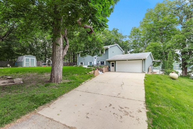 1060 Greer Ave NW, Albion Twp, MN 55358 - view of front of home with concrete driveway, a storage shed, and an attached garage