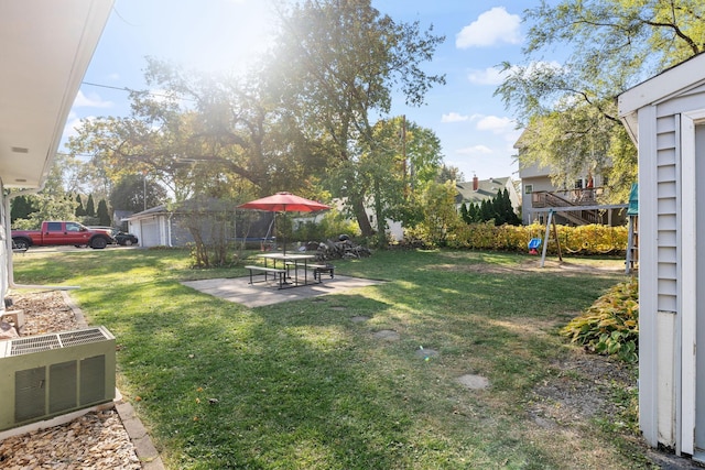 3513 Adair Ave N, Crystal, MN 55422 - view of green lawn with a patio area