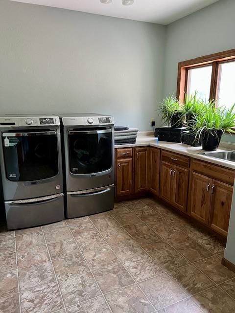 23567 Timber Trail Dr, Bemidji, MN 56601 - washroom featuring washing machine and clothes dryer and cabinet space