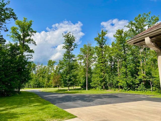 23567 Timber Trail Dr, Bemidji, MN 56601 - view of home's community featuring a yard