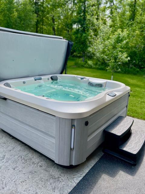 23567 Timber Trail Dr, Bemidji, MN 56601 - exterior view of a hot tub