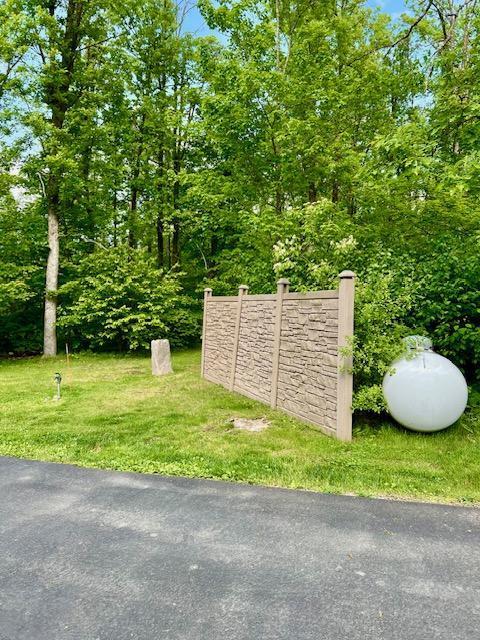 23567 Timber Trail Dr, Bemidji, MN 56601 - exterior view of propane tank