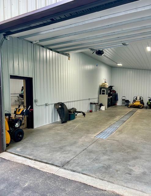 23567 Timber Trail Dr, Bemidji, MN 56601 - garage featuring a garage door opener