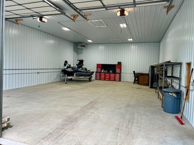 23567 Timber Trail Dr, Bemidji, MN 56601 - garage featuring a garage door opener