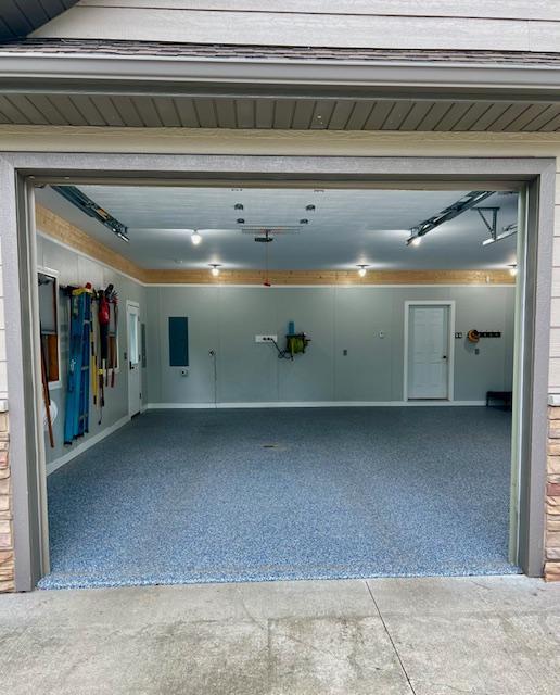 23567 Timber Trail Dr, Bemidji, MN 56601 - garage featuring baseboards