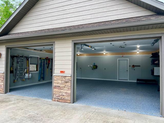 23567 Timber Trail Dr, Bemidji, MN 56601 - garage with driveway