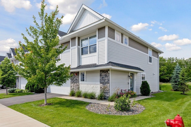 13824 102nd Pl N, Maple Grove, MN 55369 - view of property exterior with asphalt driveway, a yard, a garage, board and batten siding, and stone siding