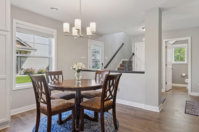13824 102nd Pl N, Maple Grove, MN 55369 - dining room with dark wood finished floors, a chandelier, and stairs