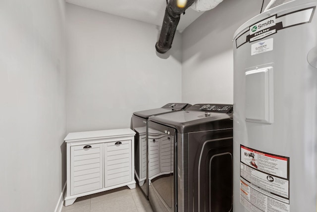 13824 102nd Pl N, Maple Grove, MN 55369 - laundry room featuring water heater, washer and clothes dryer, and tile patterned floors