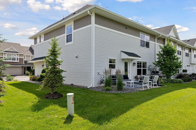 13824 102nd Pl N, Maple Grove, MN 55369 - rear view of property featuring an outdoor living space and a lawn