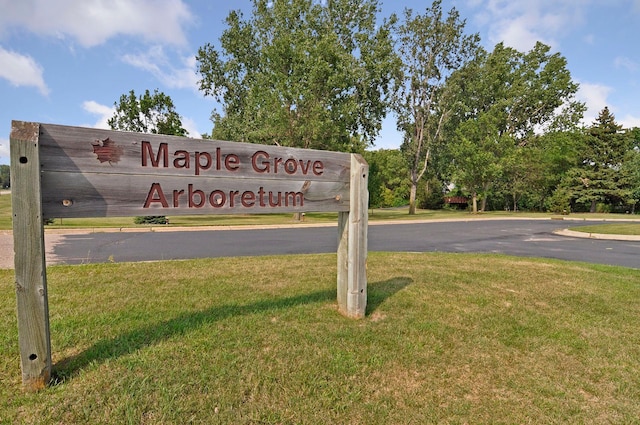 13824 102nd Pl N, Maple Grove, MN 55369 - community / neighborhood sign featuring a lawn