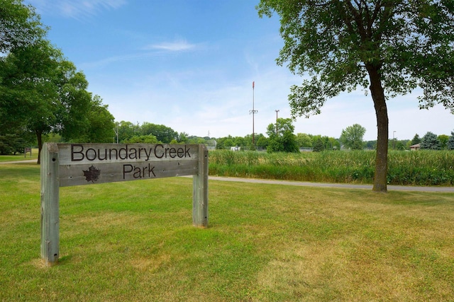 13824 102nd Pl N, Maple Grove, MN 55369 - community / neighborhood sign featuring a yard