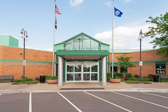 13824 102nd Pl N, Maple Grove, MN 55369 - view of building exterior with uncovered parking