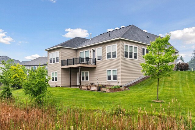 19086 100th Pl N, Maple Grove, MN 55311 - rear view of property featuring a lawn, a shingled roof, and a deck