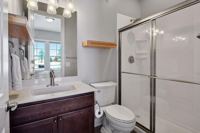 19086 100th Pl N, Maple Grove, MN 55311 - full bathroom featuring a shower stall, vanity, and toilet