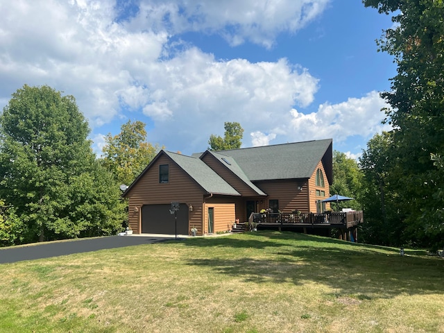 454 Wagon Wheel Dr SE Unit 17, Ten Lake Twp, MN 56601 - view of front of property with a wooden deck, asphalt driveway, a front lawn, and a garage