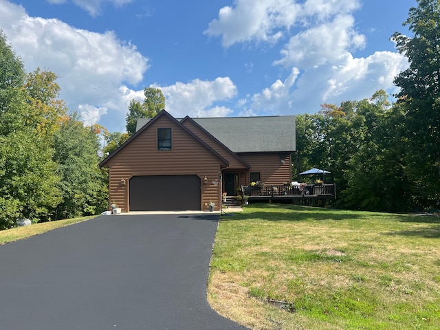 454 Wagon Wheel Dr SE Unit 17, Ten Lake Twp, MN 56601 - view of front of home with driveway, a garage, a deck, a front lawn, and log veneer siding