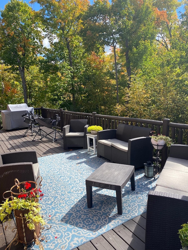 454 Wagon Wheel Dr SE Unit 17, Ten Lake Twp, MN 56601 - wooden deck featuring an outdoor hangout area and a grill