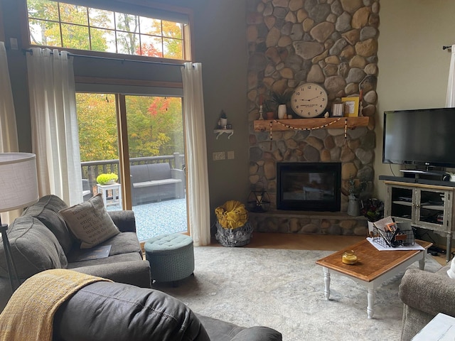 454 Wagon Wheel Dr SE Unit 17, Ten Lake Twp, MN 56601 - living room featuring a fireplace and a towering ceiling