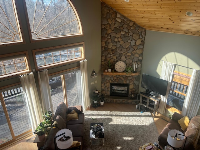 454 Wagon Wheel Dr SE Unit 17, Ten Lake Twp, MN 56601 - living room featuring a fireplace, high vaulted ceiling, and wood ceiling