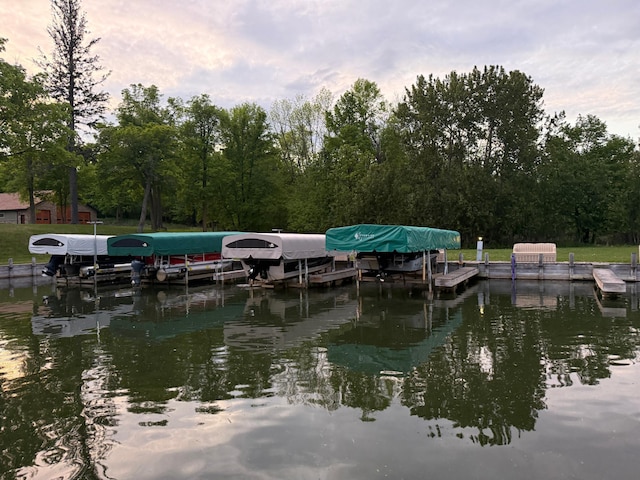 454 Wagon Wheel Dr SE Unit 17, Ten Lake Twp, MN 56601 - dock with boat lift and a water view