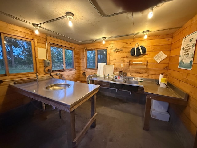 454 Wagon Wheel Dr SE Unit 17, Ten Lake Twp, MN 56601 - home office with wooden walls and concrete floors