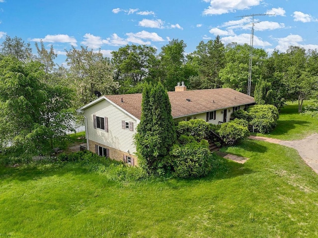 43394 Long Lake Ln, Ottertail, MN 56571 - view of property exterior featuring a yard and a chimney