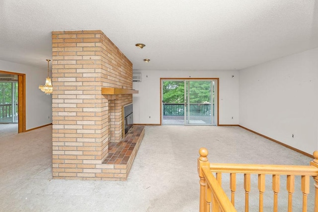 43394 Long Lake Ln, Ottertail, MN 56571 - unfurnished living room featuring a textured ceiling, light colored carpet, a brick fireplace, an AC wall unit, and healthy amount of natural light