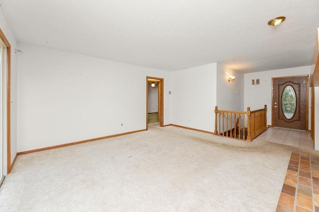 43394 Long Lake Ln, Ottertail, MN 56571 - empty room featuring a textured ceiling and light carpet
