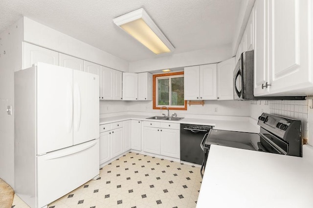 43394 Long Lake Ln, Ottertail, MN 56571 - kitchen featuring black appliances, white cabinetry, light countertops, and a textured ceiling