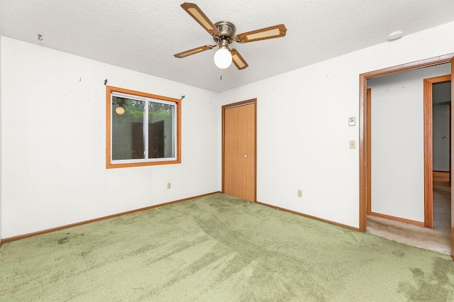 43394 Long Lake Ln, Ottertail, MN 56571 - spare room featuring carpet floors, a textured ceiling, a ceiling fan, and a smoke detector