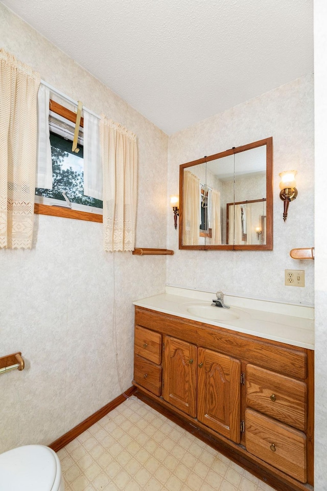 43394 Long Lake Ln, Ottertail, MN 56571 - bathroom with vanity, tile patterned floors, and a textured ceiling