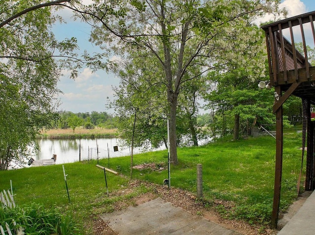 43394 Long Lake Ln, Ottertail, MN 56571 - view of green lawn featuring a water view