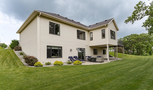 4338 Stone Crest Ln NE, Rochester, MN 55906 - back of property featuring a patio area, a lawn, and an outdoor living space