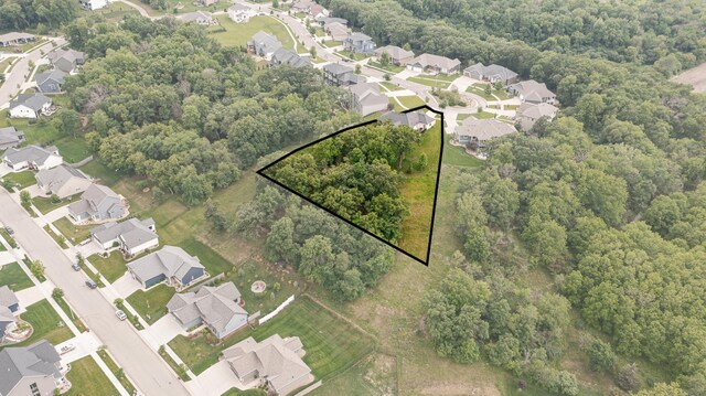 4338 Stone Crest Ln NE, Rochester, MN 55906 - aerial perspective of suburban area featuring property boundaries highlighted and a forest