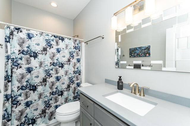 4338 Stone Crest Ln NE, Rochester, MN 55906 - bathroom with toilet, vanity, a shower with curtain, and recessed lighting