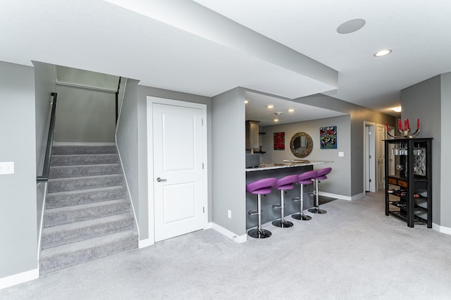 4338 Stone Crest Ln NE, Rochester, MN 55906 - staircase with carpet flooring, baseboards, a dry bar, and recessed lighting