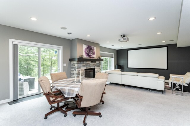 4338 Stone Crest Ln NE, Rochester, MN 55906 - carpeted dining area featuring recessed lighting, a stone fireplace, and baseboards