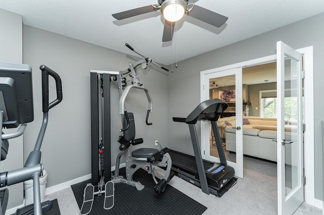4338 Stone Crest Ln NE, Rochester, MN 55906 - exercise room featuring ceiling fan, light carpet, baseboards, and french doors