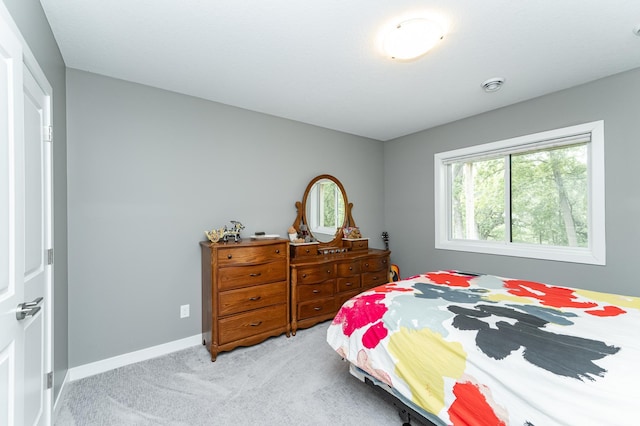 4338 Stone Crest Ln NE, Rochester, MN 55906 - bedroom featuring light colored carpet and baseboards