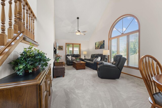 14023 Yellow Pine St NW, Andover, MN 55304 - living area featuring light carpet, a ceiling fan, and high vaulted ceiling