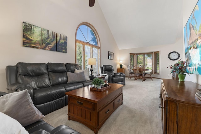 14023 Yellow Pine St NW, Andover, MN 55304 - living area featuring high vaulted ceiling, light colored carpet, healthy amount of natural light, and ceiling fan
