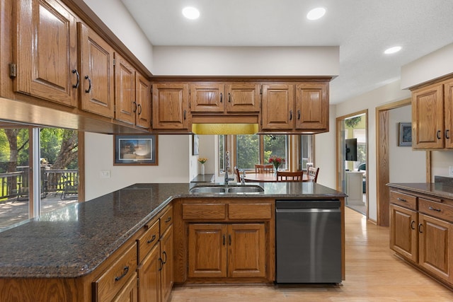 14023 Yellow Pine St NW, Andover, MN 55304 - kitchen featuring stainless steel dishwasher, brown cabinetry, a peninsula, recessed lighting, and light wood-style floors
