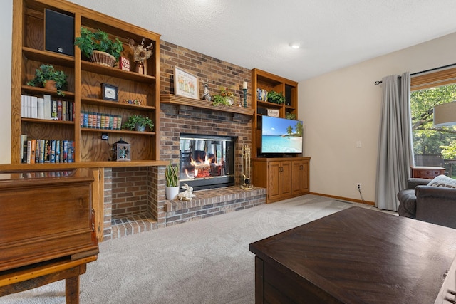 14023 Yellow Pine St NW, Andover, MN 55304 - carpeted living room featuring a fireplace and baseboards