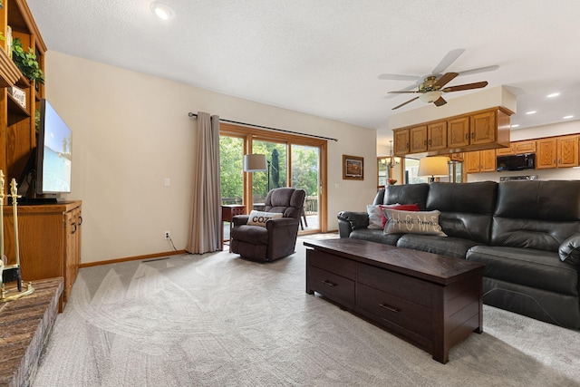 14023 Yellow Pine St NW, Andover, MN 55304 - living room featuring ceiling fan, light colored carpet, and recessed lighting