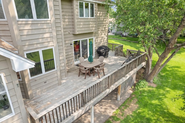 14023 Yellow Pine St NW, Andover, MN 55304 - deck featuring outdoor dining space and a lawn