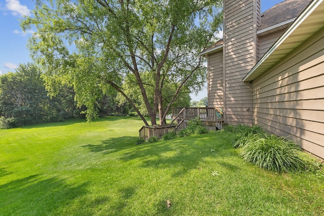 14023 Yellow Pine St NW, Andover, MN 55304 - view of green lawn featuring a deck