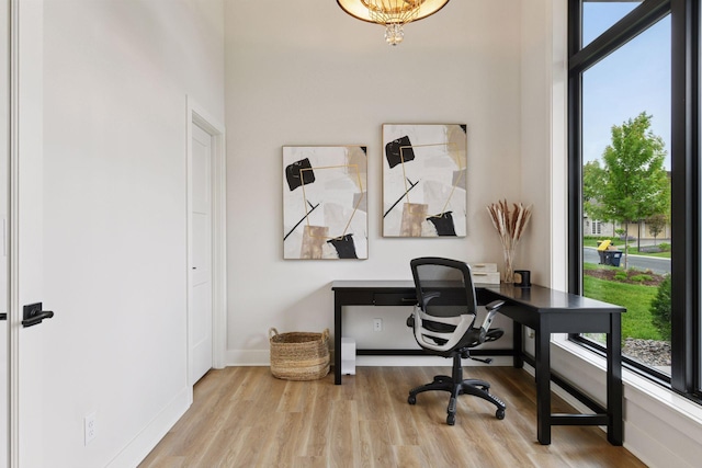 4998 Beach St NE, Prior Lake, MN 55372 - office with healthy amount of natural light, wood finished floors, and baseboards
