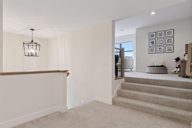 4998 Beach St NE, Prior Lake, MN 55372 - staircase featuring carpet floors, a chandelier, baseboards, and recessed lighting